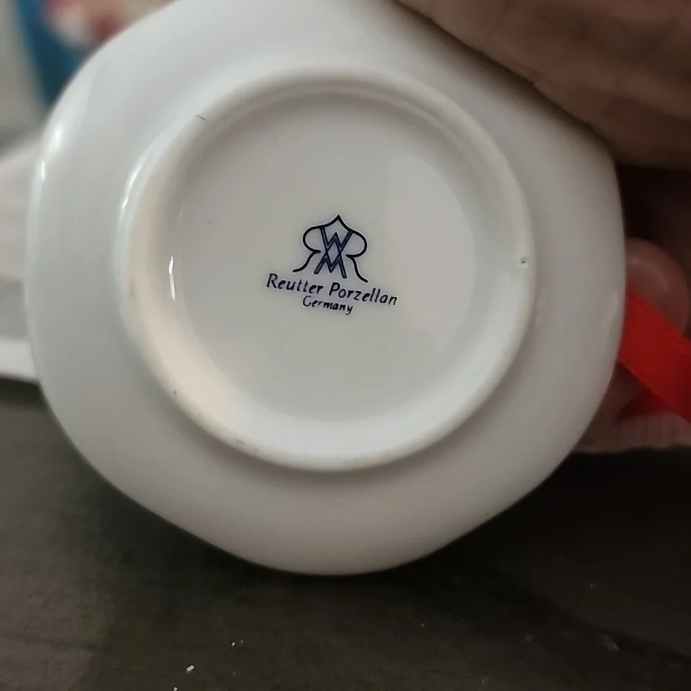 Christmas ornaments, miniature tea cups and tea pots